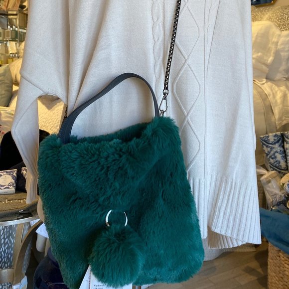 green faux fur bag